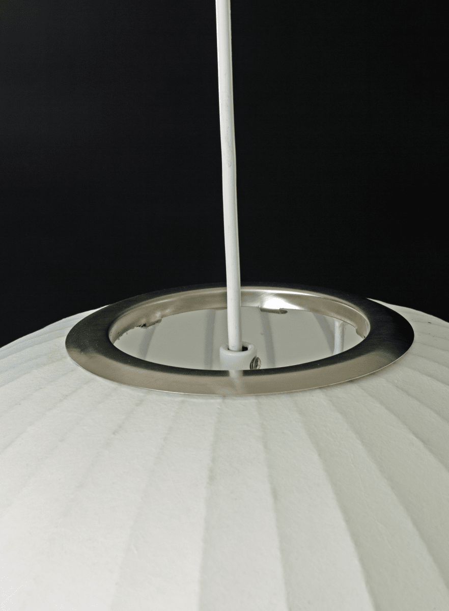 Kanoa Ø40 Wit hanglamp Van Aneta Lighting - Wanneer de lamp brandt, verspreidt zich een aangenaam licht door de stof, wat bijdraagt aan een warme en gezellige sfeer in de kamer.