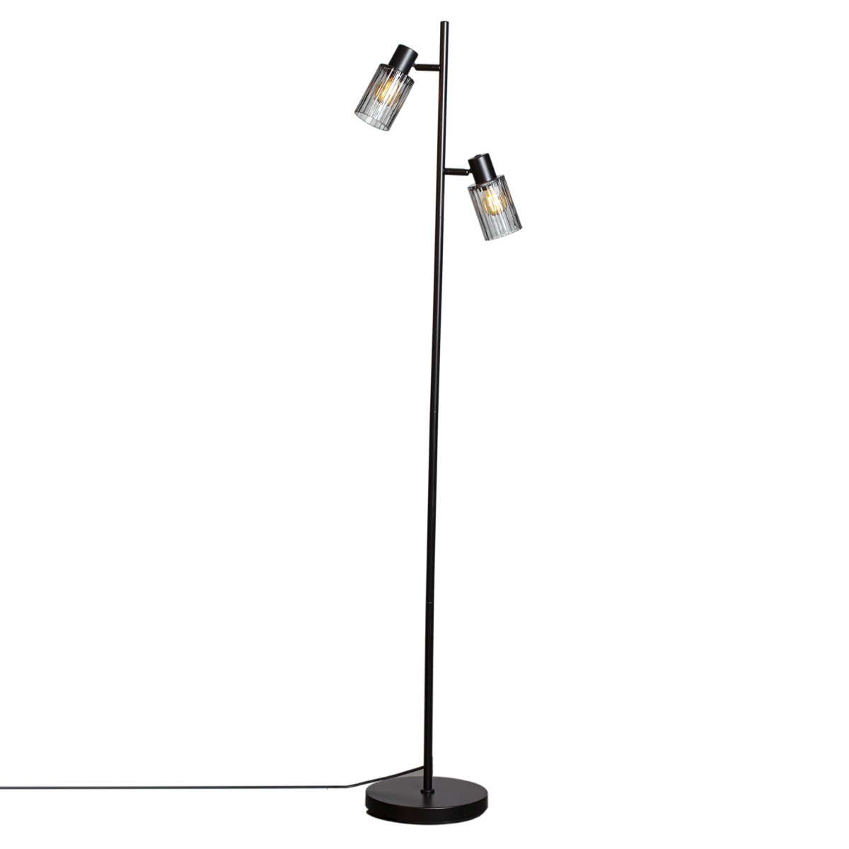 Kiera 2 Zwart/Rookkleurig vloerlamp Van Cottex - Het getinte glas zorgt voor een zacht en sfeervol licht, terwijl de geribbelde structuur een prachtig lichtspel cre&euml;ert.