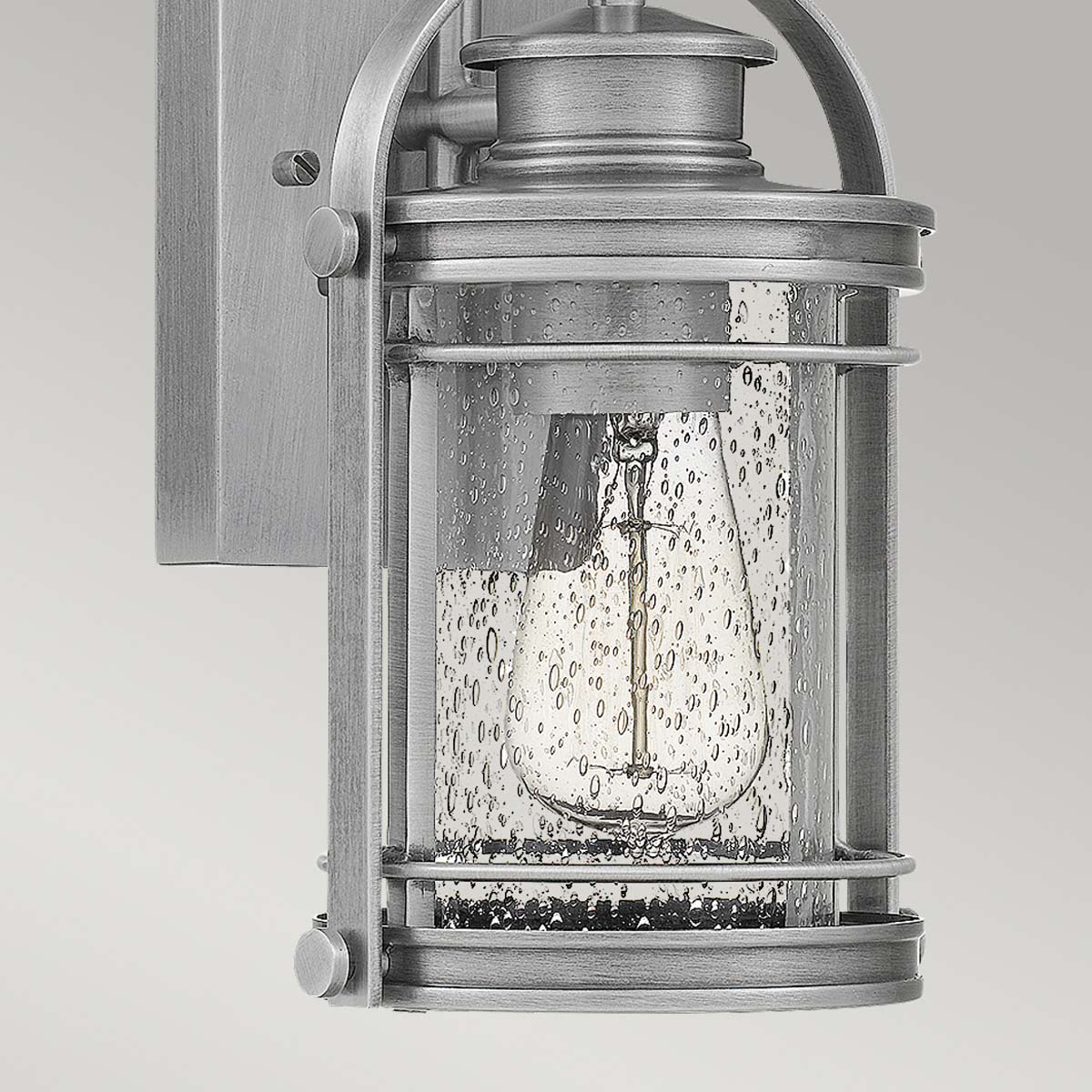 Booker 28cm Aluminium buitenlamp Van Elstead Lighting - Booker &auml;r en stilfull och robust fasadlampa med en design inspirerad av klassiska marina lanternor.