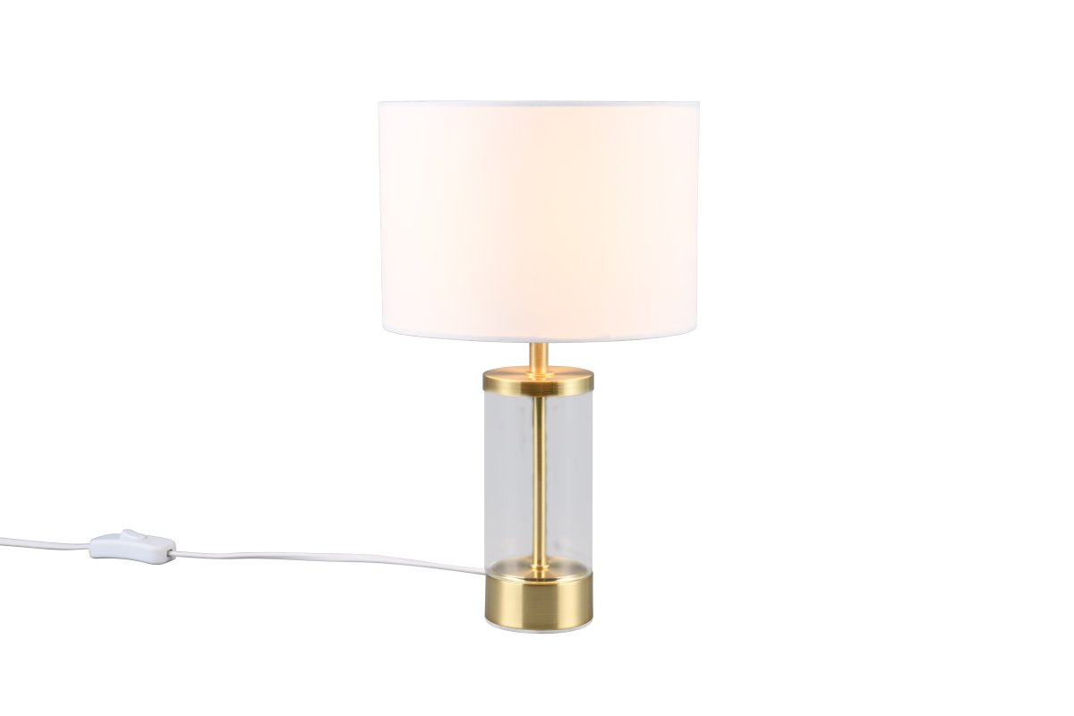 Grazia 34cm Mat messing tafellamp Van Trio Lighting - De Grazia tafellamp combineert een elegante stoffen kap met een stijlvolle cilindrische voet van glas en metaal, wat een harmonieuze en verfijnde indruk geeft.