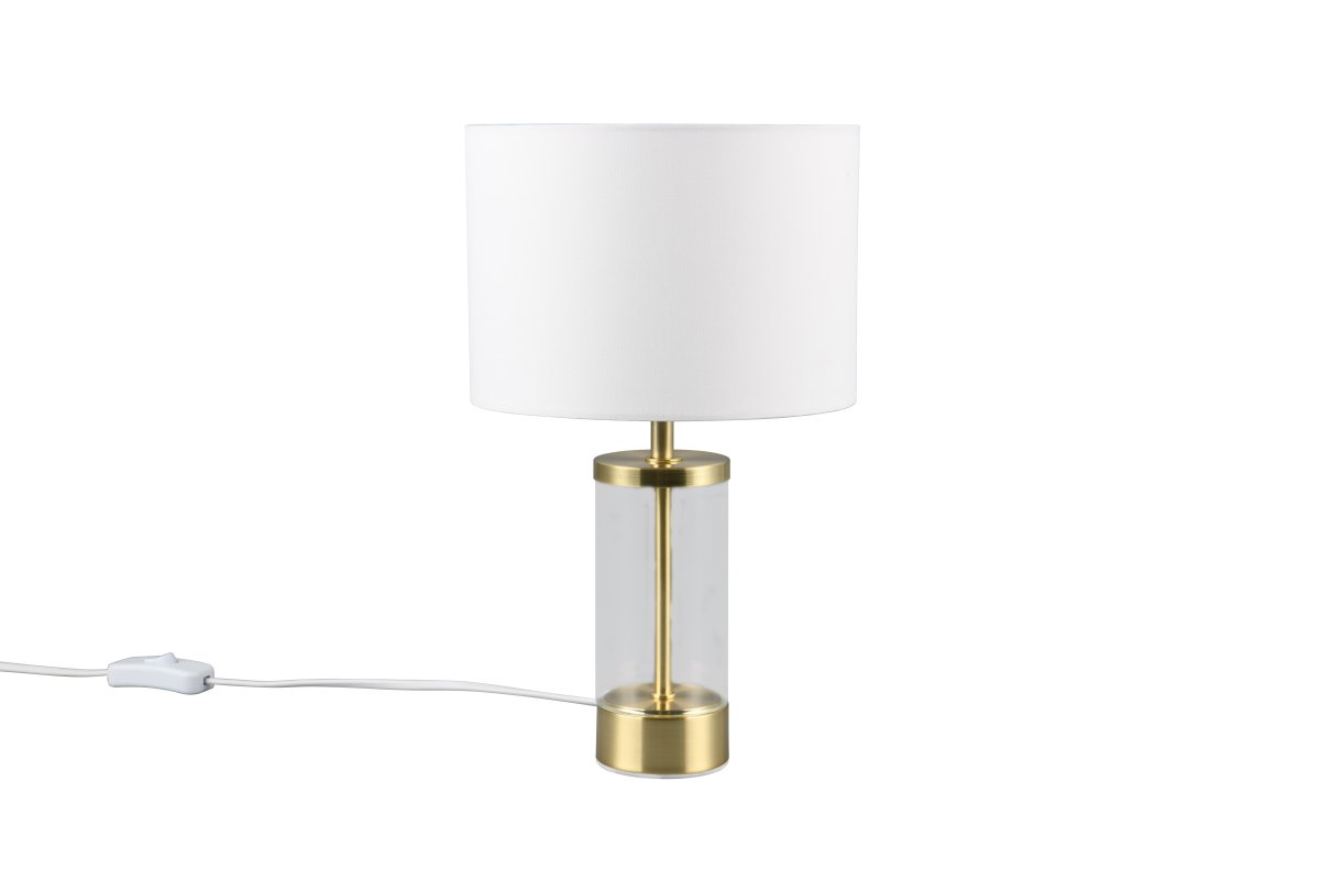 Grazia 34cm Mat messing tafellamp Van Trio Lighting - De Grazia tafellamp combineert een elegante stoffen kap met een stijlvolle cilindrische voet van glas en metaal, wat een harmonieuze en verfijnde indruk geeft.