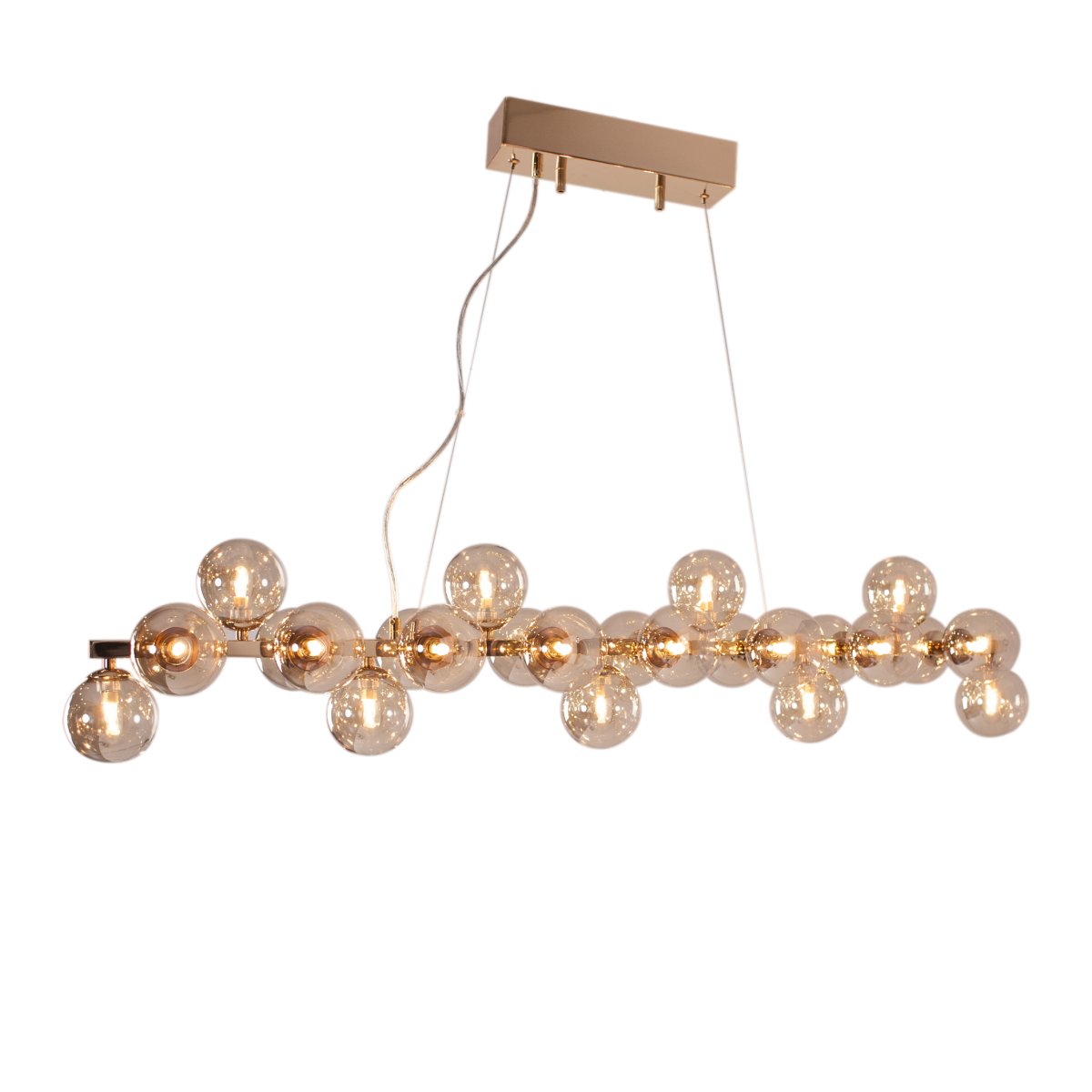 Splendor 124cm Amber hanglamp Van By Rydéns - De glazen zijn in een effectief patroon over de lengte van de lamp geplaatst.