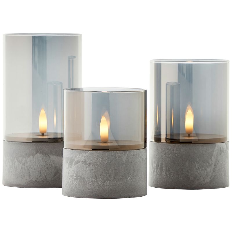 Bougie 3 Stuks Grijs/rook Van Brilliant - De Bougie LED-kaarsen in een verpakking van 3 zijn een stijlvolle verlichtingsoplossing die zowel binnen als buiten een warme en gezellige sfeer cre&euml;ert.