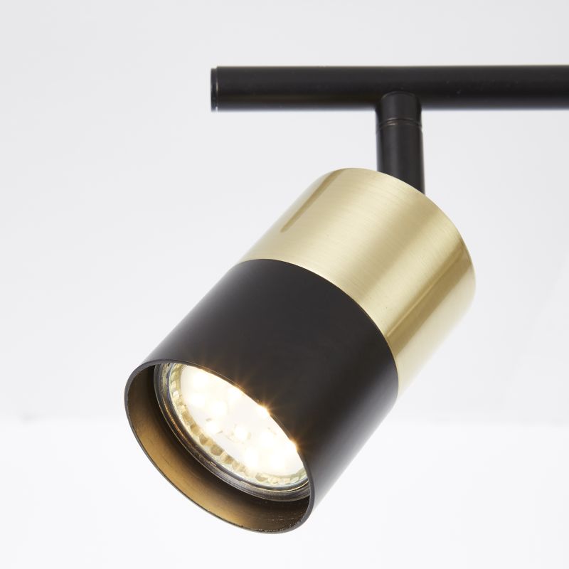 Maribel 2 Zwart/geborsteld messing spot Van Brilliant - Hij kan zowel aan het plafond als aan de muur worden bevestigd en heeft verstelbare lampenkoppen waarmee je het licht kunt richten waar je het nodig hebt - van het accentueren van details tot het verlichten van de hele kamer.
