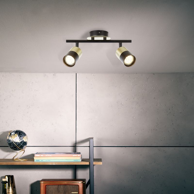 Maribel 2 Zwart/geborsteld messing spot Van Brilliant - Hij kan zowel aan het plafond als aan de muur worden bevestigd en heeft verstelbare lampenkoppen waarmee je het licht kunt richten waar je het nodig hebt - van het accentueren van details tot het verlichten van de hele kamer.